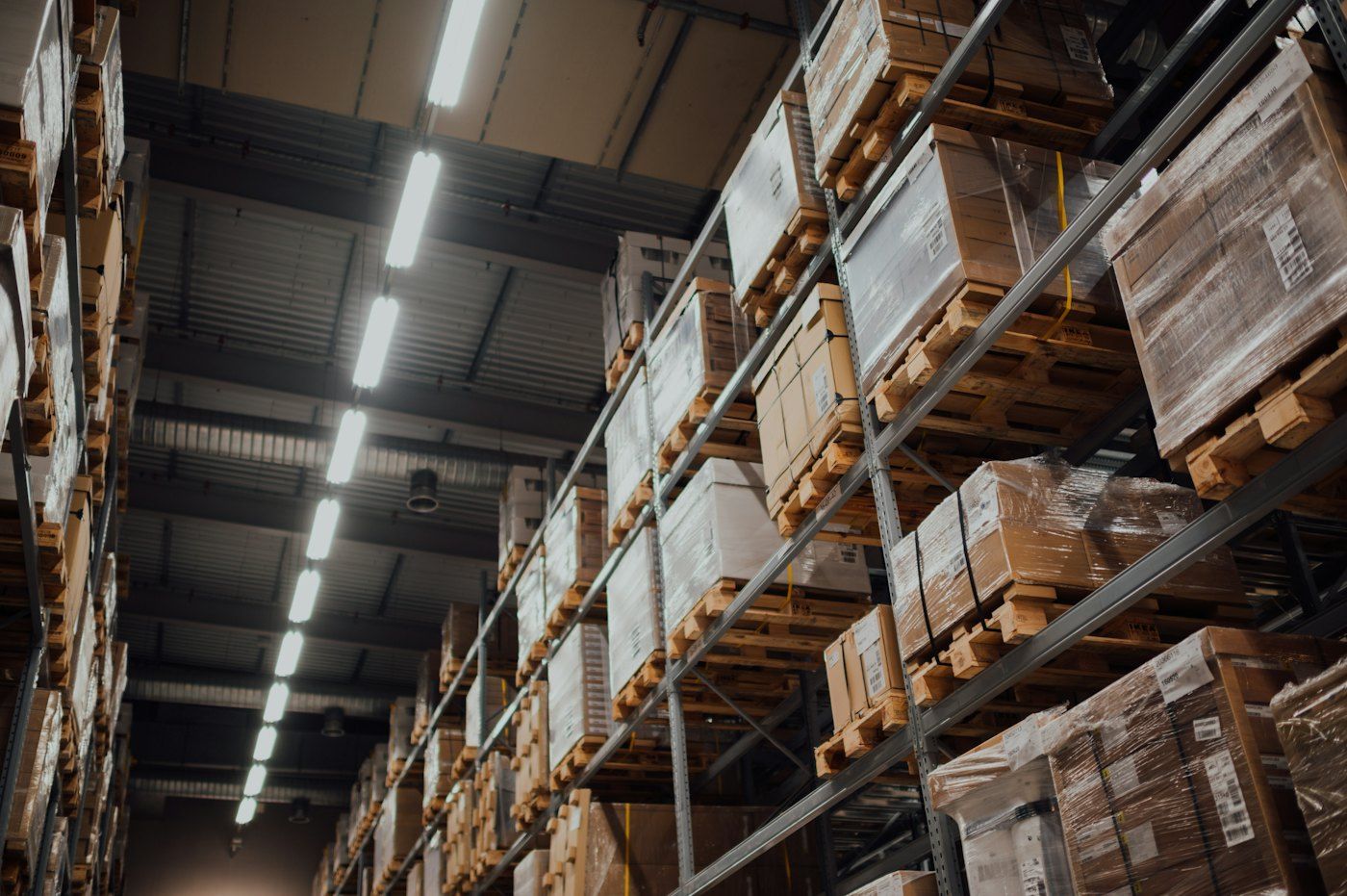 Warehouse shelves stacked with cartons